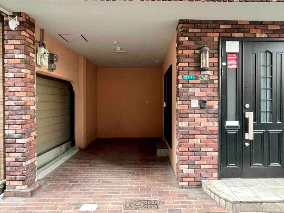 Ferienwohnung 鶴橋駅徒歩2分 トイレ浴室複数あり3階建て一軒家車庫付き Ōsaka Exterior foto